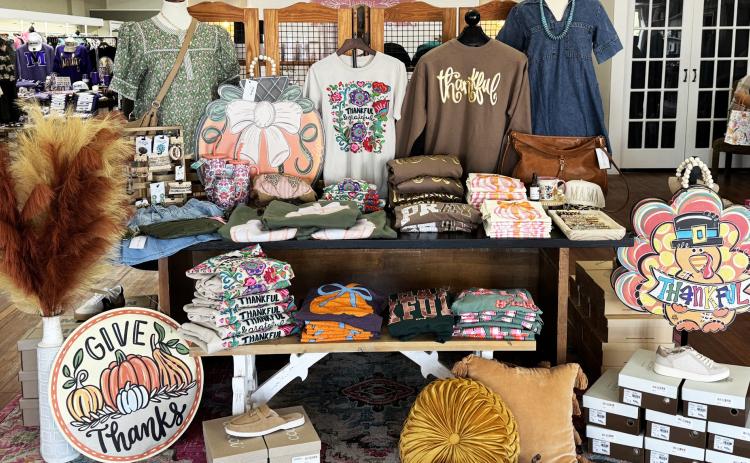 CLOTHING, SHOES, ACCESSORIES, OH MY! The Wild Bloom offers a fun array of clothing, shoes, accessories, kids clothing and gift items at their new location following their grand opening Oct. 4 at 110 E. Main St. in Munday. | RACHEL FARMER
