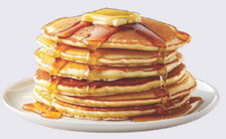 Munday Lions Club serving pancakes for Senior Night