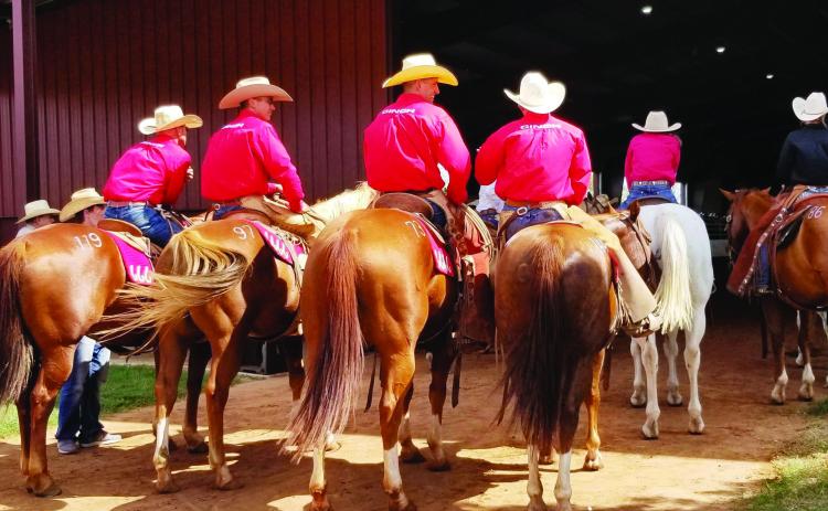 RETURN TO REMUDA At the 6666 horse barn in Guthrie, riders wait to demonstrate the skills and features of their mounts during the annual Return to the Remuda sale. | COURTESY PHOTO