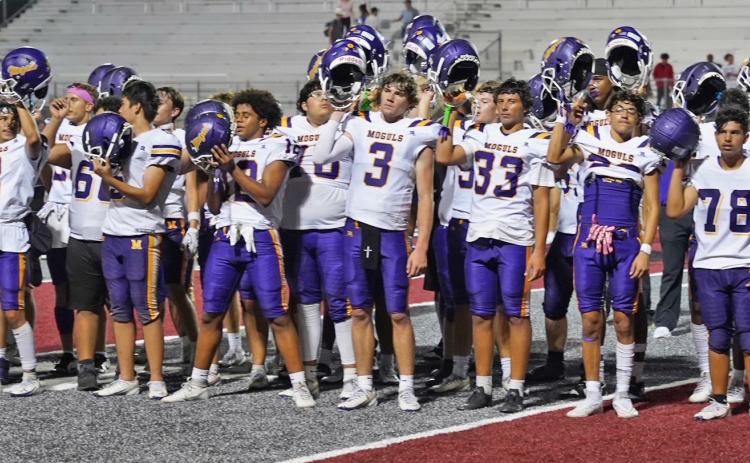 MUNDAY GETS THE W The Munday Moguls celebrate their first win of the season ,scoring 53-14 over TLCA. | LACI BOWMAN PHOTO