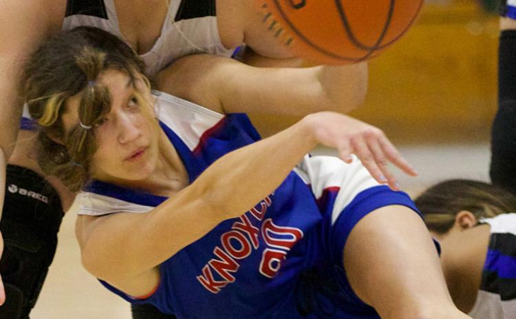Jaden Baxter makes the pass as she goes to the floor. | SHERI BATY PHOTO