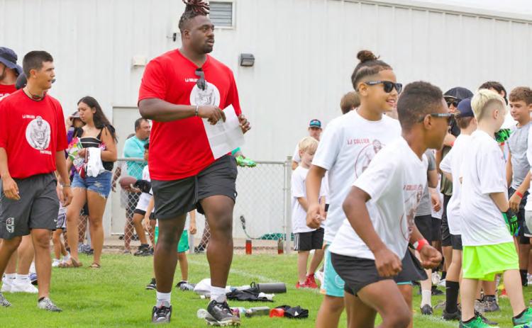 NATIVE SON Arizona Cardinal and Munday native LJ Collier's football camp was held Saturday from 9:00 a.m. until noon at the Munday High School's sports complex. It was a perfect morning for the event with cloudy overcast skies and cooler than normal temperatures. MORE PHOTOS, PAGE 6 | SHERI BATY PHOTOS