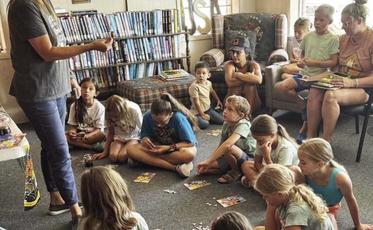 THE MAGIC OF READING program continued this past weekend at the Munday City-County Library with Librarian Amanda Burbank overseeing Saturday’s theme of “potions”, followed by games of BINGO. | COURTESY PHOTO