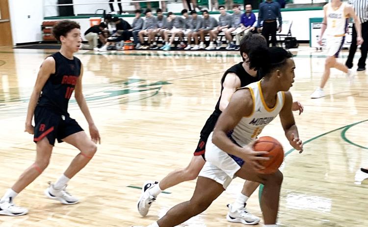 MUNDAYTUESDAYWIN #11 Junior Ethan Flye and #3 Sophomore Haiden Bowman drive the action in Munday'sbi-districtvictoryovertheRobyLions55-40TuesdayinHamlin. |SUEJANESULLIVANPHOTO