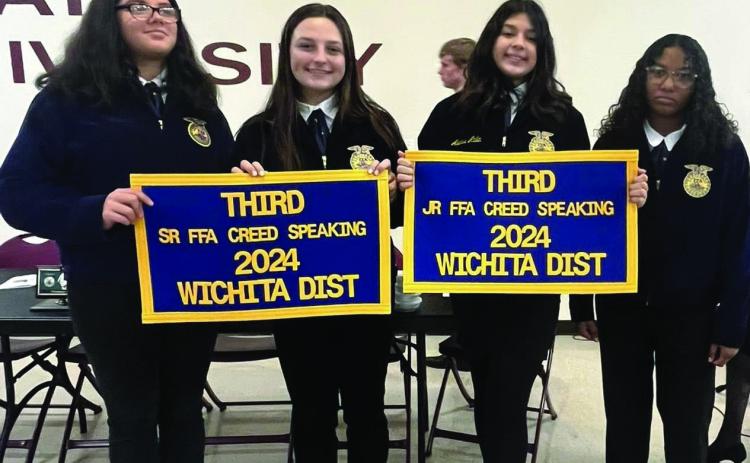 FFA WICHITA DISTRICT BANQUET Lexi Abila received her banner for Jr. Creed Speaking and Kinlee Eaton received her banner for Sr. CreedspeakingattheWichitaDistrictBanquet. | COURTESYPHOTO