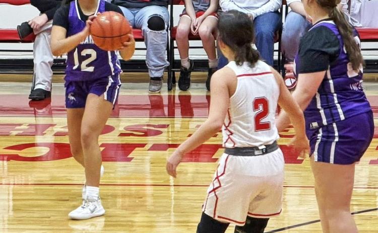 FIRST DISTRICTWIN Lady Stangs finally took control of the game in overtime and won 39-38 to earn their first district win of the season. | COURTESY PHOTO