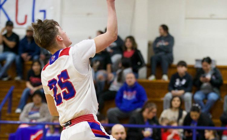 NicholasTrevino gets the fastbreak for the layup. | SHERI BATY PHOTO