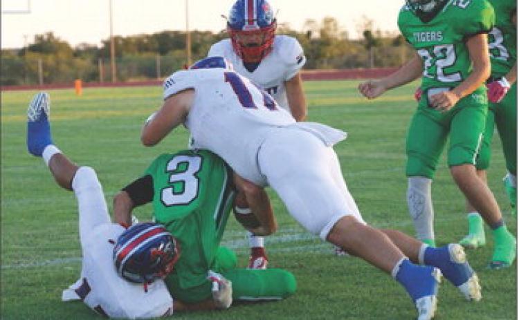 Blake Abila and Tristin Baxter make the defensive stop. | SHERI BATY PHOTO