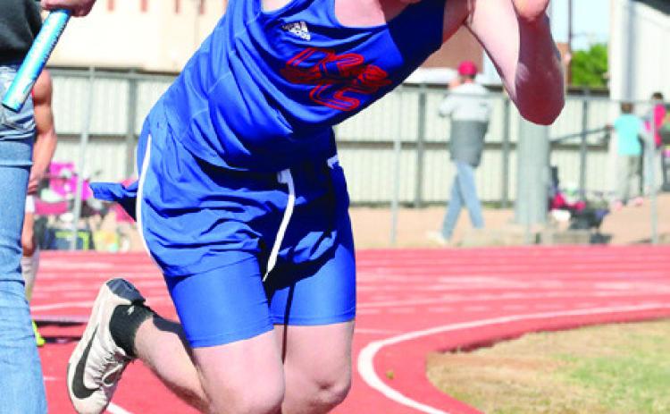 John Cross Utley is the first runner of the 4x200m relay_ the relay advances to the Area meet Sheri Baty/The Knox County News-Courier