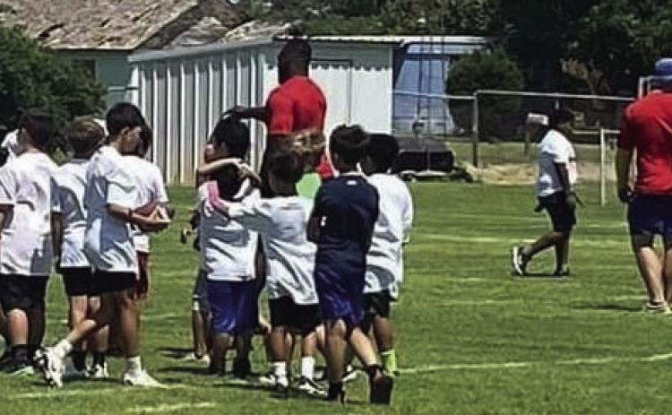SPOTLIGHT ON L.J. COLLIER FOOTBALL CAMP