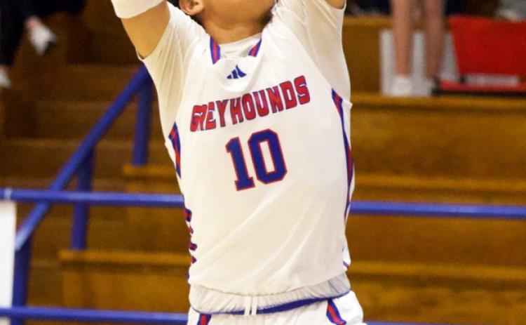 GRAB AND GO FOR TWO Hunter Lerma got the grab and go for two points as the Greyhounds top the Wildcats and come away with the win and are in a great position heading toward the playoffs. The Greyhounds are currently in fourth place in district standings. | SHERI BATY PHOTO