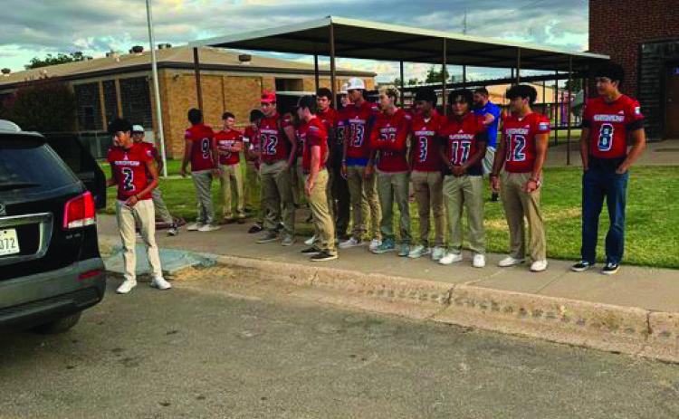 GREYHOUNDS GREET STUDENTS The KC Greyhound Football team opening doors and greeting Elementary and Junior High students last Friday morning. | COURTESY PHOTO