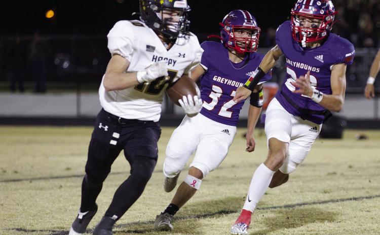 RUNDOWN Bryson Callaway and Caleb Arrieta runs down the Happy Cowboy. | SHERI BATY PHOTO