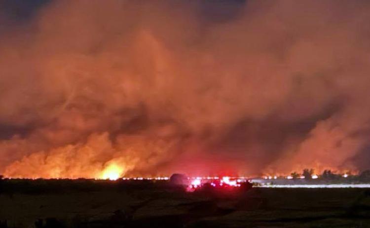 OMINIOUS GLOW The massive Grover Bend fire could be seen from miles away. Fortunately the fire was in a sparse vegetation area away from structures. | COURTESY PHOTO