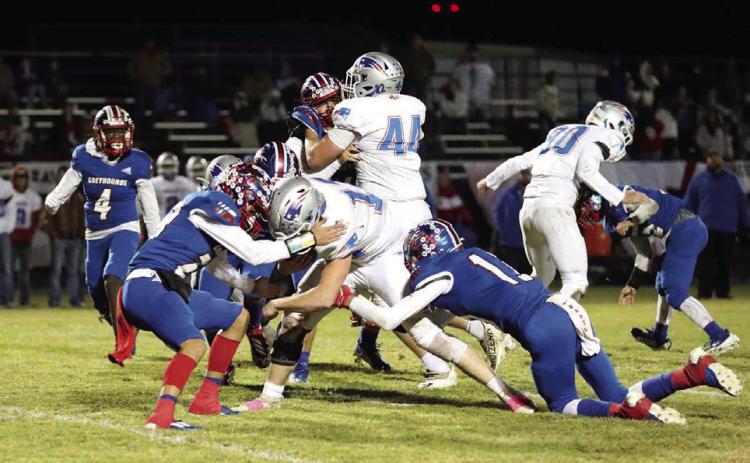 Greyhound defense, Bryson Callaway and Cameron Hernandez making the stop Sheri Baty/The Knox County News-Courier