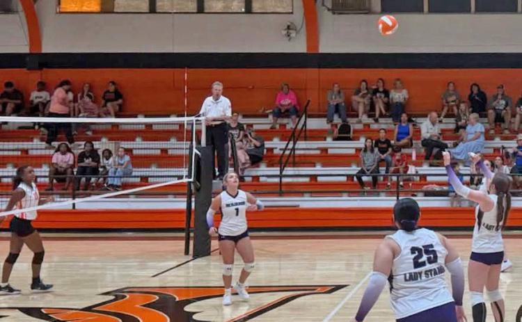 PATIENCE waiting to set up the return Benjamin volleyball came home with JH and HS wins at Paducah. | Courtesy Photo