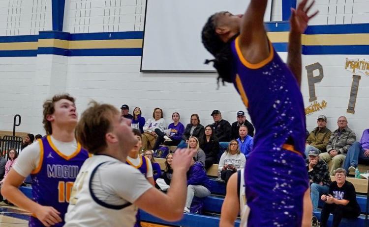 EXCITING VICTORY Ja’Riyis Williams puts the ball up and in for 2 in what turned out to be an exciting victory for the Moguls with a final score of 59-53. The Moguls upset the reigning state champions Perrin-Whitt last week on the road.