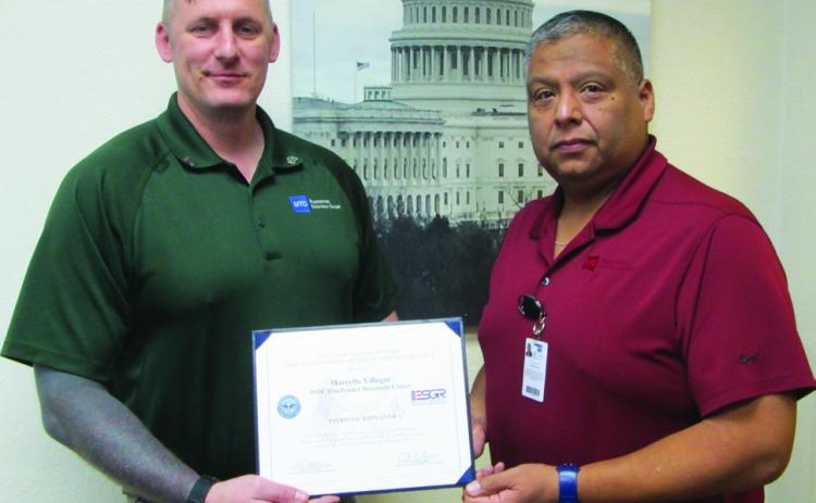 RECOGNIZINGBLUEBONNETDETENTIONCENTER Sgt.Rothermel (left) and Warden Villegas (right) proudly display the Patriotic Employer Award, recognizing Bluebonnet Detention Center’s commitment to supporting military service members in the workplace. | COURTESY PHOTO